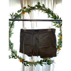Olive green shorts.